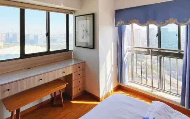 Tuwu Theme Apartment (Jiashan Railway Station Renmin Avenue)