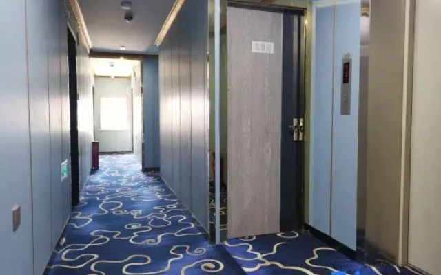 Xinmeijia Business Hotel (Huatian Town)