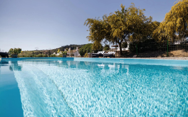 Casa Grande / Rosas Cantares