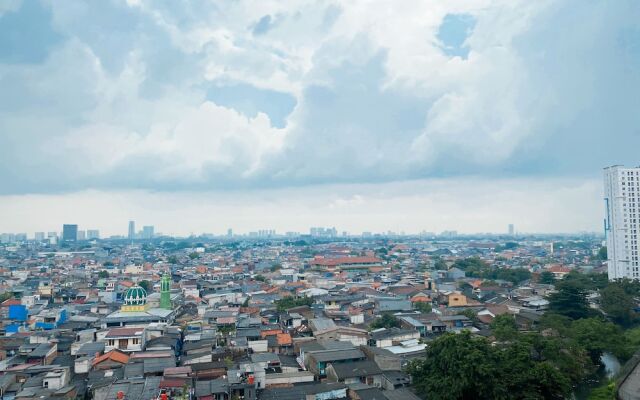 Modern Look And Restful 2Br Bassura City Apartment Near Mall