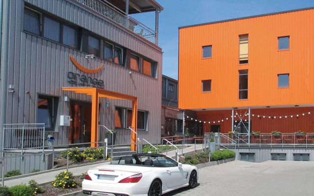 Orange Hotel und Apartments
