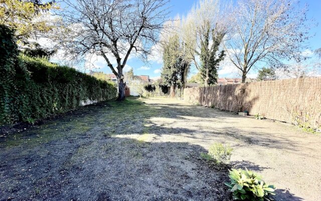 Belle maison avec grand jardin et garage