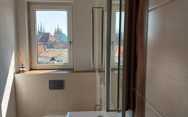 AT THE TOP - Penthouse über den Dächern der Stadt