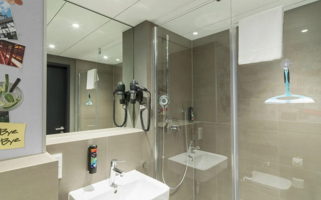 Отель Holiday Inn - the niu, Timber Esslingen, an IHG Hotel