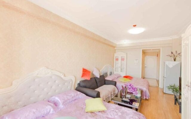Aiqinhai ApartHotel