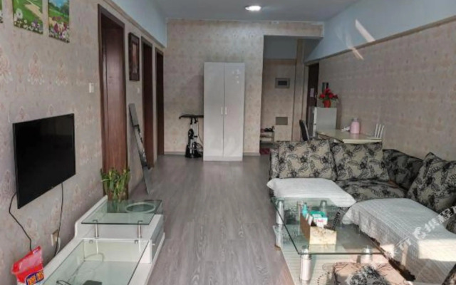 Qingqing Wojia Hotel Style Apartment