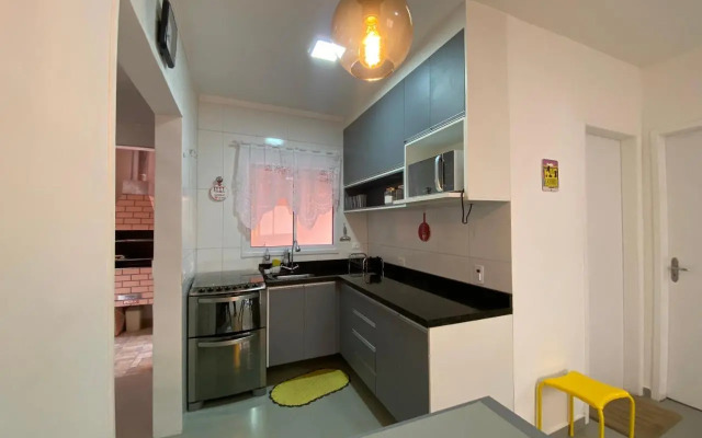 Casa em Bertioga condomínio 250 metros da praia