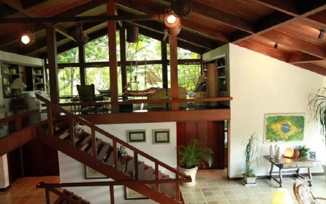 SMI012 Casa charmosa em condomínio à beira mar