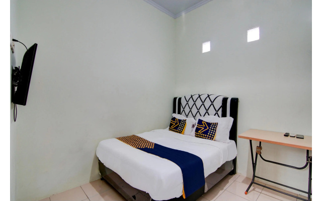 Hotel O Awi Stay Syariah Near SIMPANG KAWASAN INDUSTRI WILMAR PELINTUNG – Guest Rooms – Pelintung