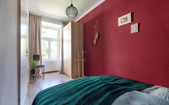 Colorful Apartment Facing Green Courtyard