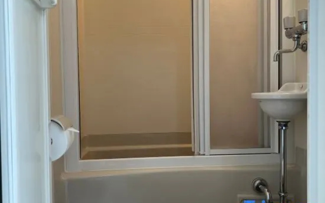 Higashi Shinjuku Station is a 3-minute walk, Shin-Okubo Station is a 7-minute walk,Shinjuku Station – Bathroom – Tokyo