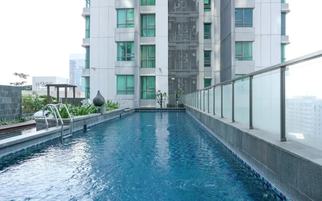 Homey with Private Lift 2BR Apartment at St. Moritz Puri near Mall – Pool – Jakarta