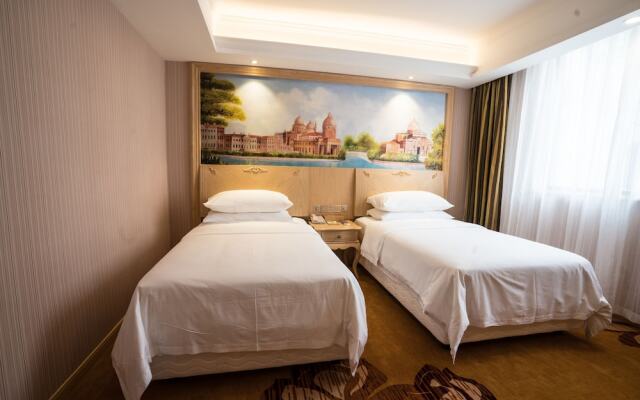 Vienna Hotel Yishan Road Station Branch