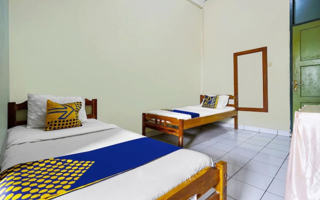 SPOT ON 91064 Wisma Lec Syariah