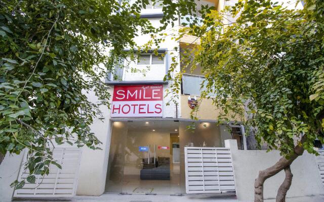 Capital O 77528 Smile Hotels