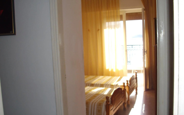 Anna in front of the sea Apartment