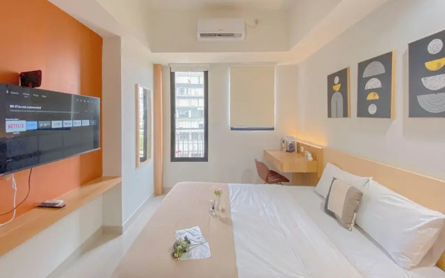 Cozy Living Studio at Evenciio Margonda Apartment