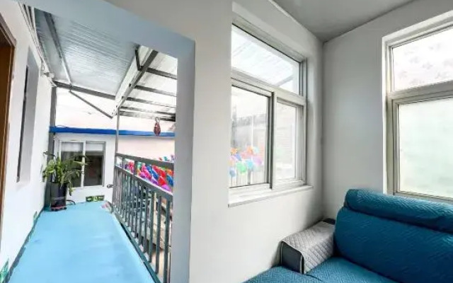 Luoyang Qingqing Yuanshe Homestay (Lijingmen Cross Street Store)
