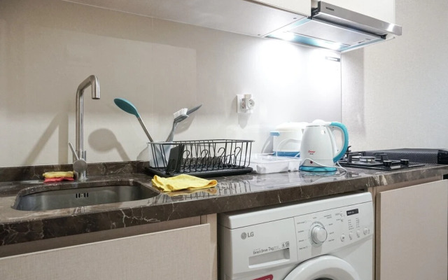 Chic and Cozy Studio Apartment at Puri Mansion