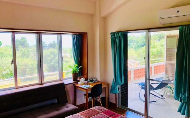Tom and Rimi's – Guest Rooms – Kumejima