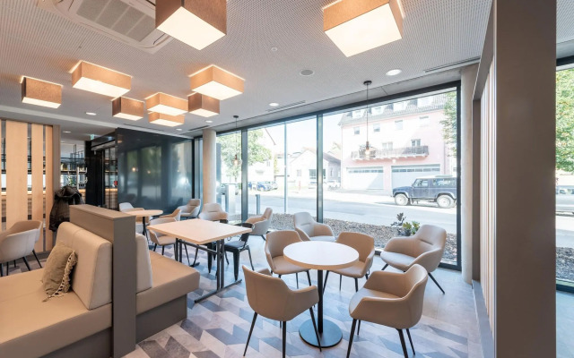 Отель Holiday Inn - the niu, Timber Esslingen, an IHG Hotel