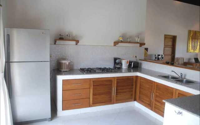 Villa Cerah Beachfront Holiday House