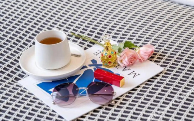 Manfei Theme Apartment (Meizhou wanda plaza Branch)