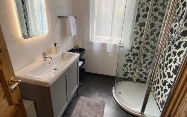 Ferienhaus "Ruhepol" im Ferienpark Extertal - Kamin, Fass-Sauna, Massagesessel