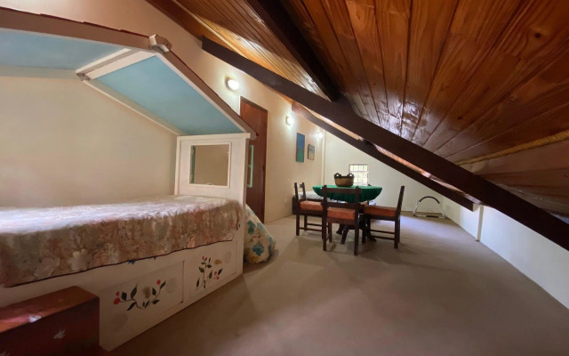 Casa com forno de pizza e vista para as montanhas