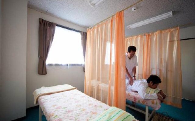Capsule Hotel New Gloria