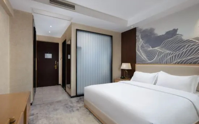 Tianhai Business Hotel (Jiujiang Liansheng Happy City Third Middle School Branch)