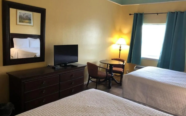 Deluxe 6 Inn & Suites