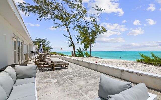 Beachfront White Palm Villa - Tar Bay