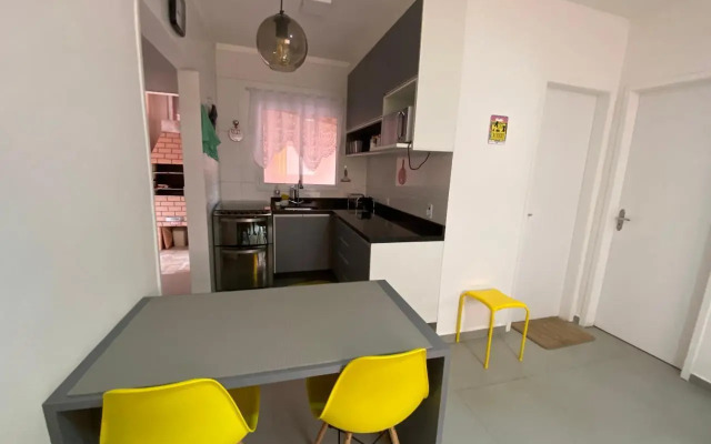 Casa em Bertioga condomínio 250 metros da praia