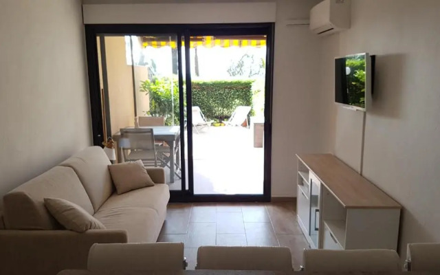 T2 rez de jardin front de mer