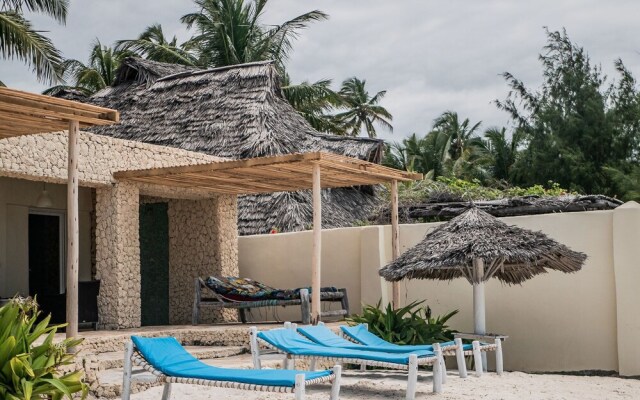 Neema Barefoot Beach House