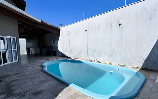 Casa com piscina em Bertioga 1