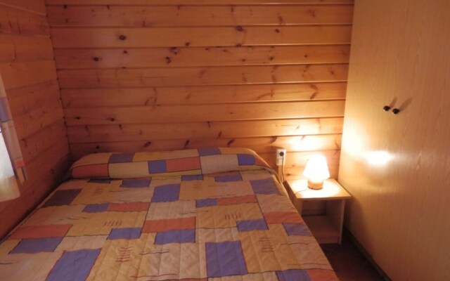 Attractive bungalow with a covered terrace, 1 km. from beach