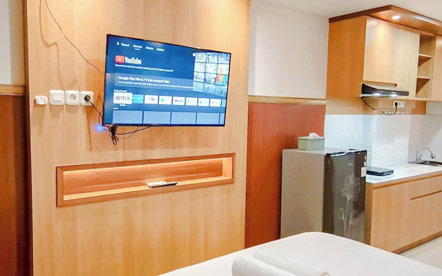Wooden Touch Studio At Tamansari Skylounge Makassar Apartment