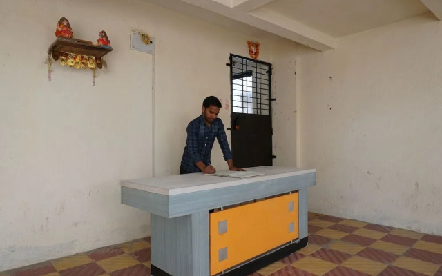 Sai Sidhi Lodge by OYO Rooms