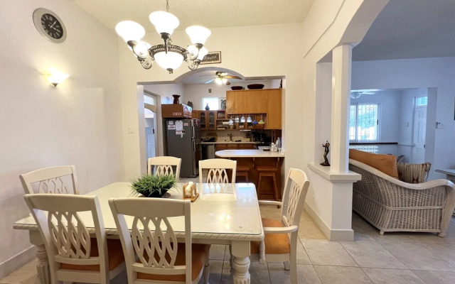 Welcome to the Unpretentious and Breezy Graceville, Steps Away From the Beach