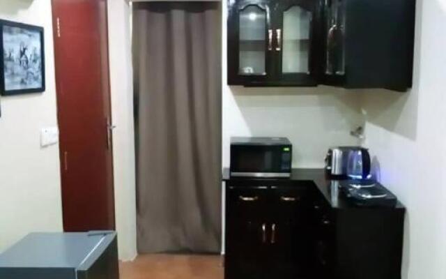 Mikocheni Studio APartment with a car