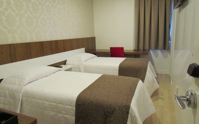 Holiday & Business Hotel - Ao lado do Centro de Eventos e Arena Conda