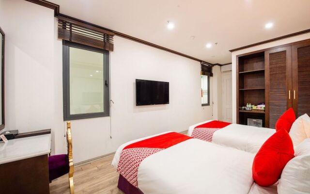 OYO 348 Suji Hotel