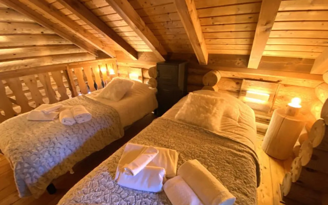 L'ours Blanc Chalet en Rondins