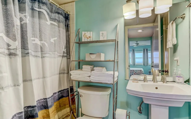 Oceanfront Beach Condo with Private Balcony, Short Walk to Pool and Beach by RedAwning