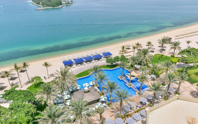 Shoreline Beachfront Luxury Palm