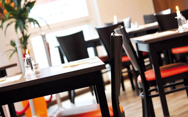 Orange Hotel und Apartments