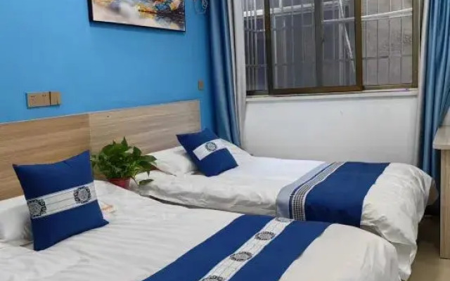 Huangting Hotel (Qingshan Lake Wanda Plaza Store)