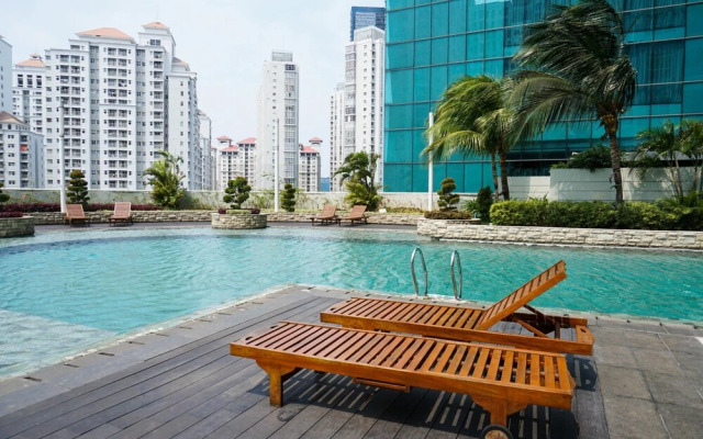 Modern 1BR Apartment at Central Park Residence By Travelio